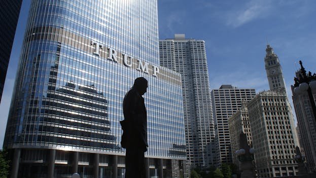 Captivating view of Chicago skyline with Trump Tower reflections and a silhouette in daylight.